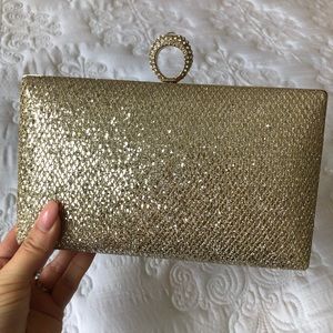 Madison West Gold clutch.